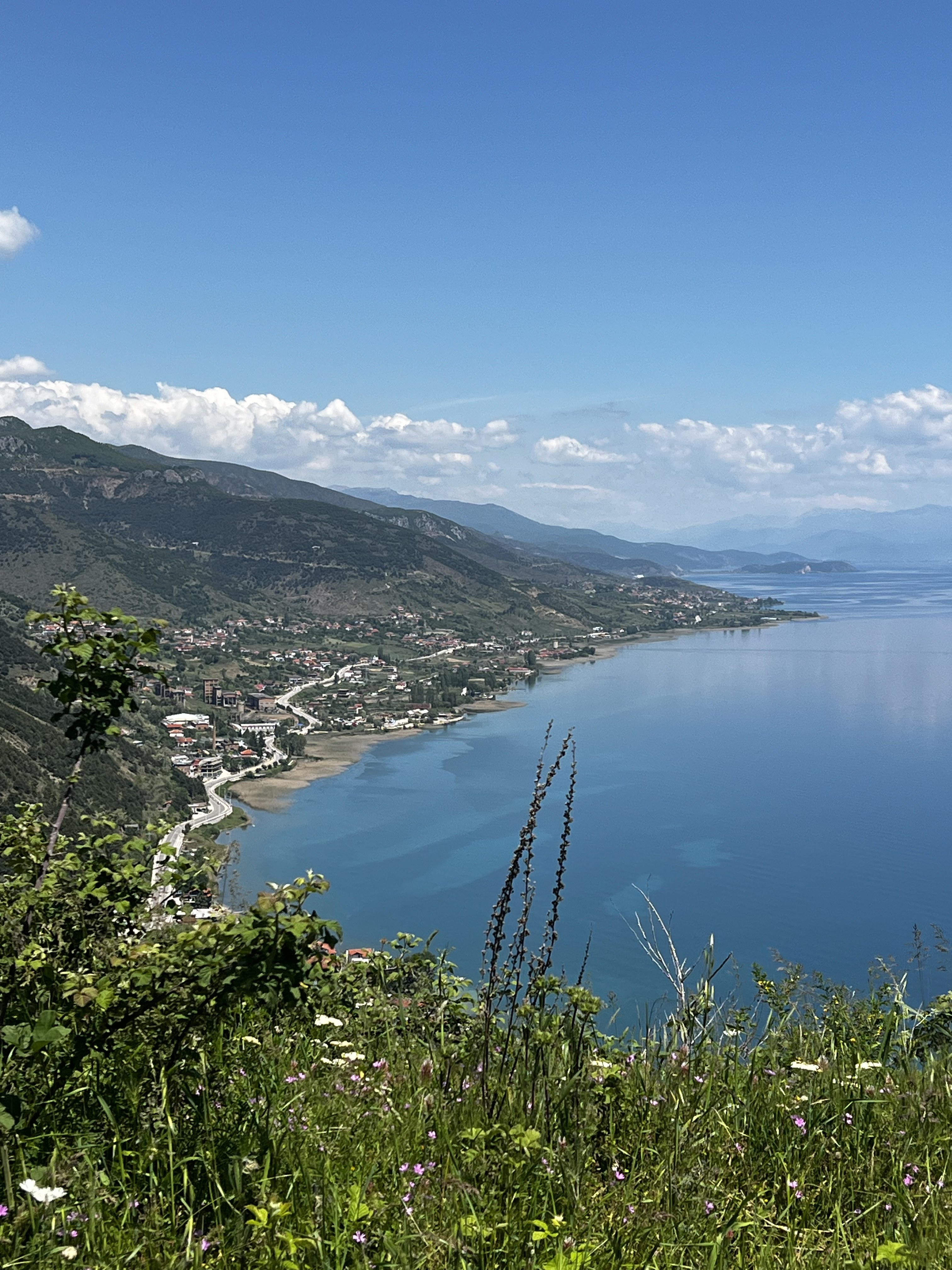 The villages of Memëlisht, Udenisht and Lin along the Lake Ohrid shore, seen from the trail up to the castle